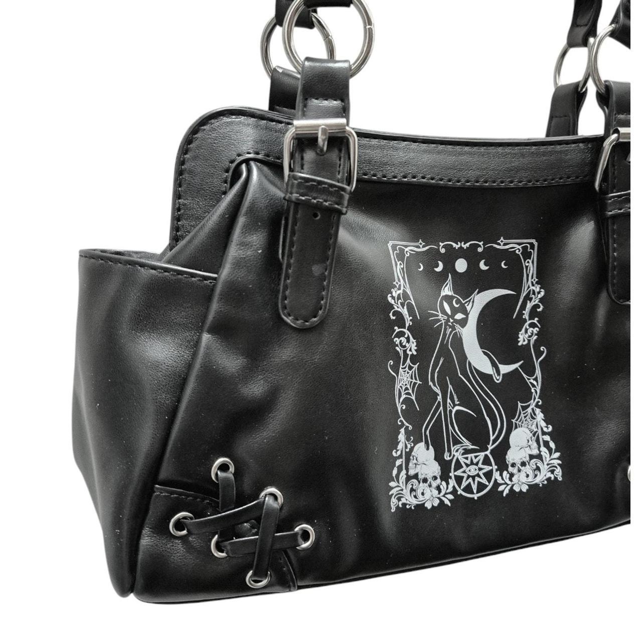 Witchy cat motif handbag