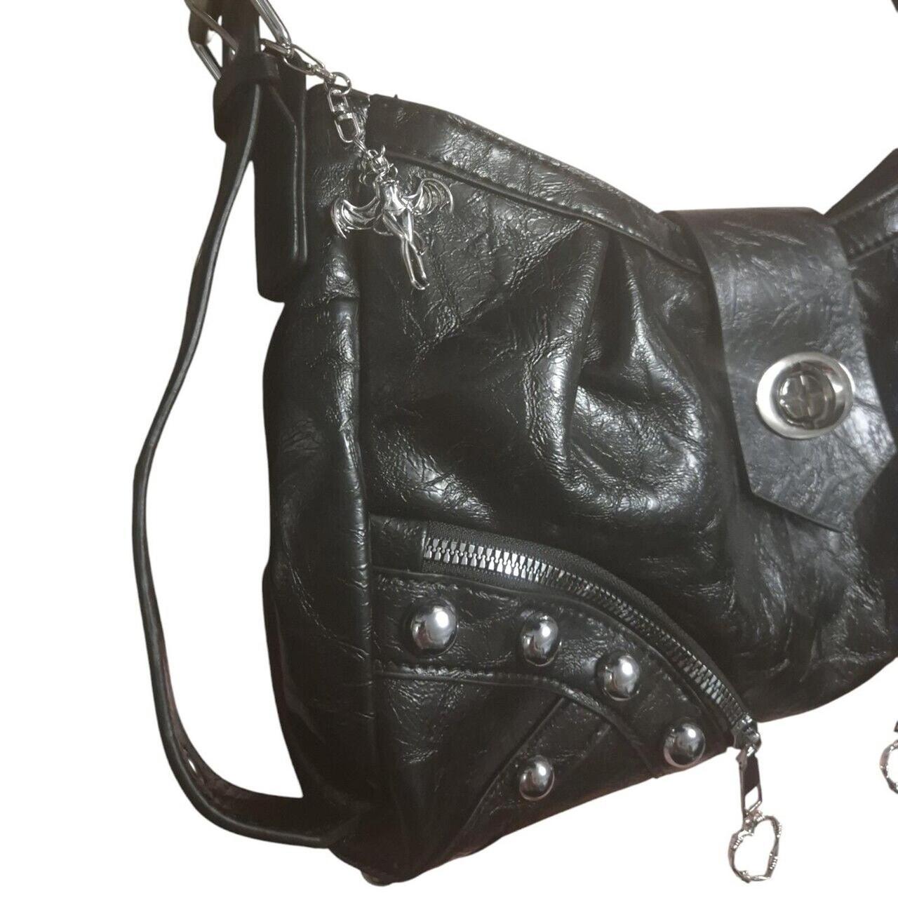 Devilish charm & barbed wire hearts handbag